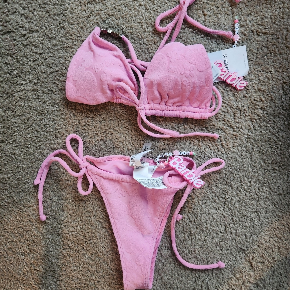 Brand new Barbie bikini tops small bottoms say medium  but I would say  small